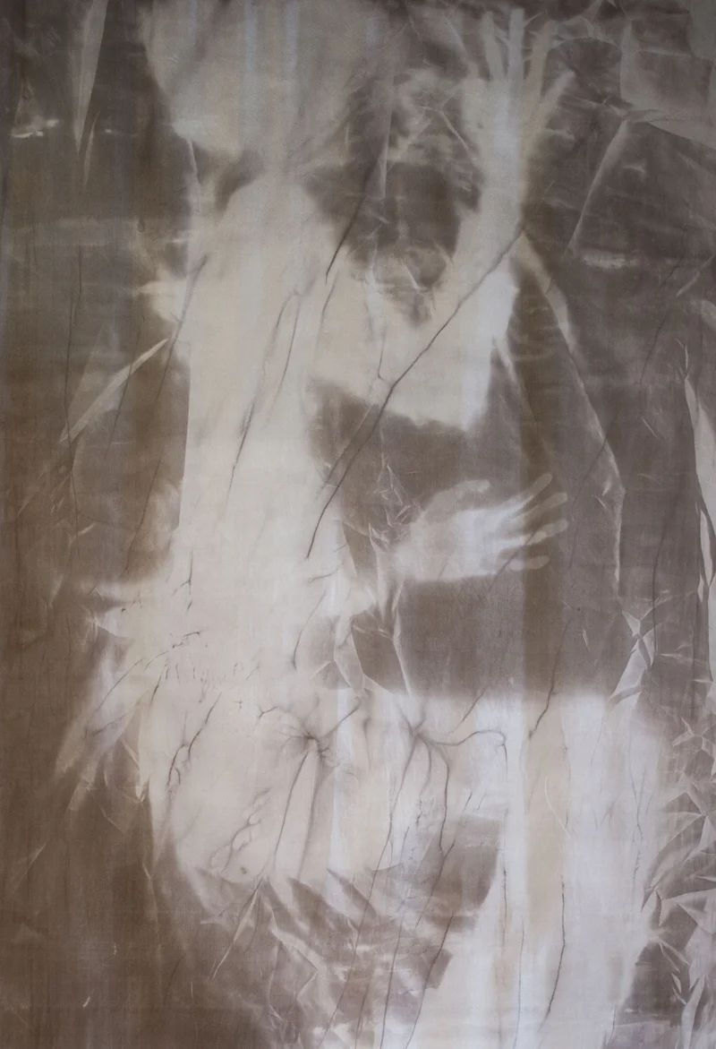 Contour of body on fabric.