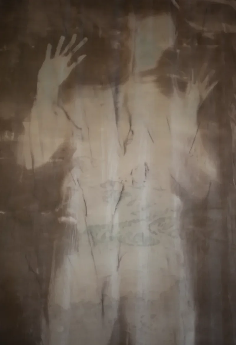 Contour of body on fabric.
